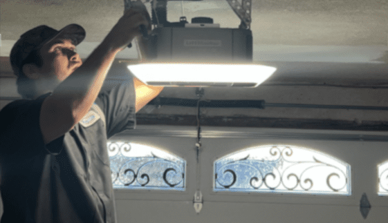 Archway Garage Doors technician servicing garage door opener in Calabasas, California
